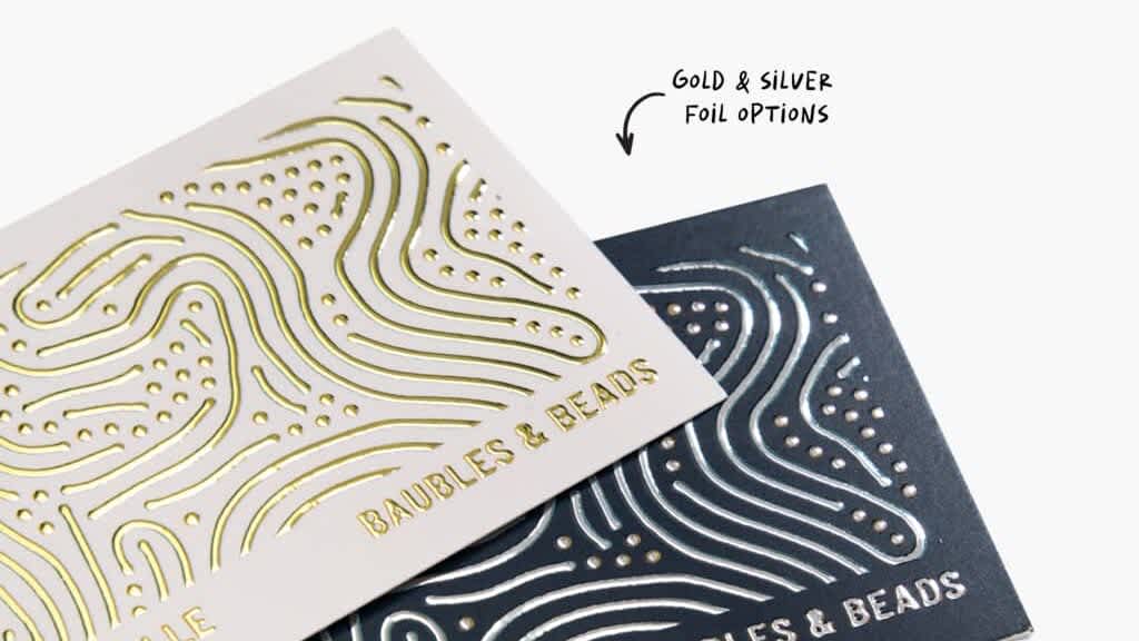 Business card designs with golden and silver foil accents