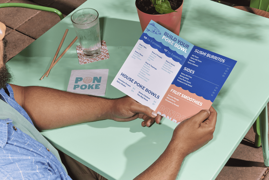 A bi-fold menu for a poke bowl restaurant