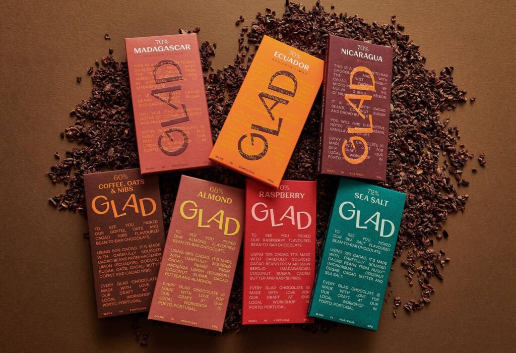 Chocolate packaging design in bold colors with storytelling elements, an example of the Narrative Pop packaging trend 2026