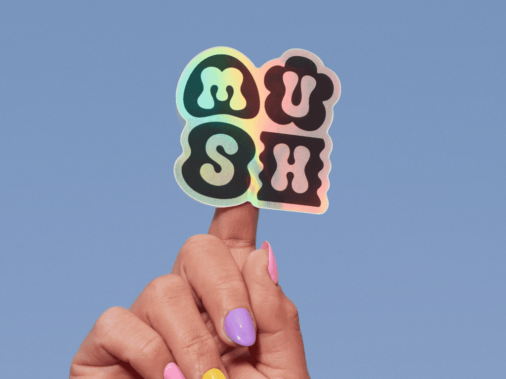A branded holographic logo for MUSH