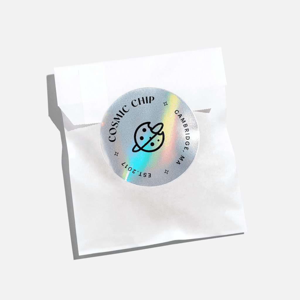 Branded sticker with a holographic finish used to seal a paper bag