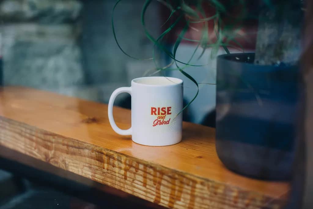 coffee mug design idea that says “Rise and Grind”