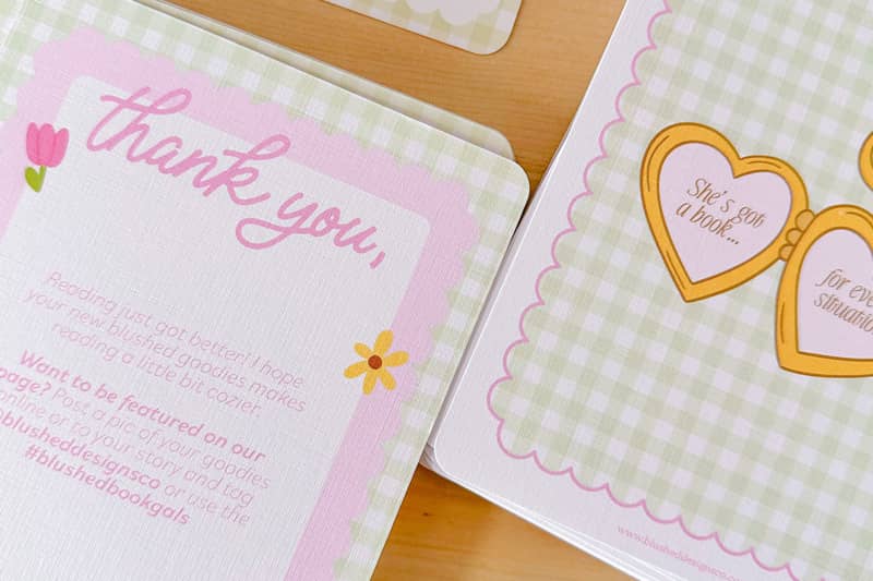 Branded thank-you and customer feedback insert cards with pastel gingham patterns, decorative illustrations and messaging designed to encourage post-purchase engagement.