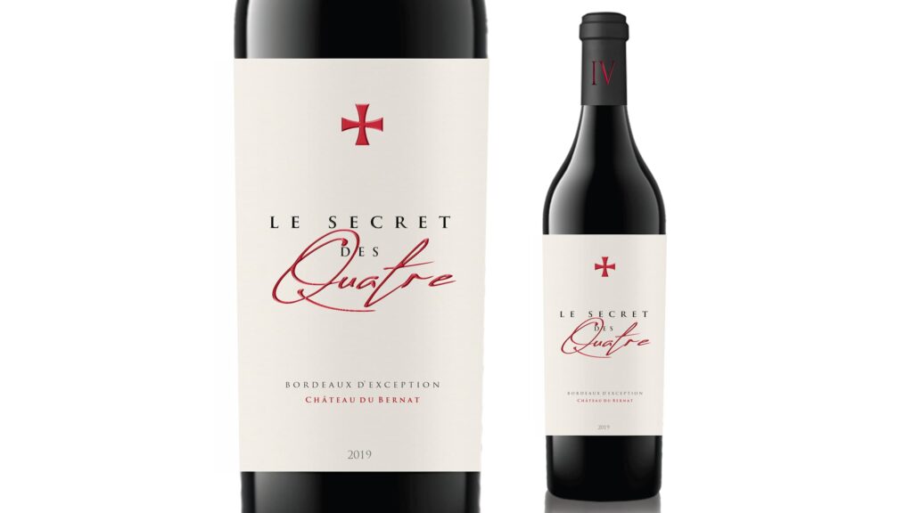 Premium wine bottle label with a refined minimalist design featuring elegant typography, subtle red foil accents, generous white space and a clean luxury aesthetic.