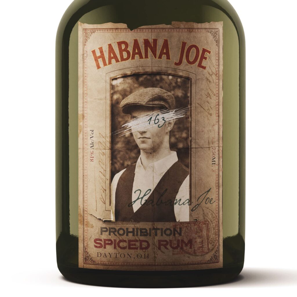 Vintage-inspired spiced rum bottle label featuring distressed paper textures, heritage-style typography, sepia photography and nostalgic design elements with an aged, prohibition-era aesthetic.
