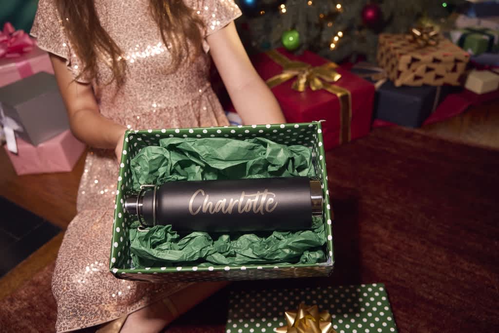 Custom insulated water bottle with the recipient’s name Charlotte printed on.