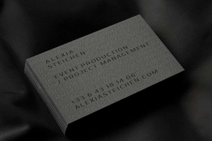 Gray business card with embossed text