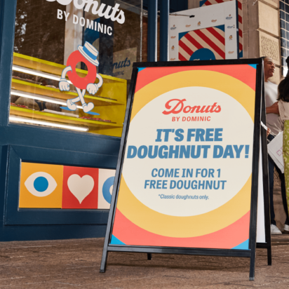 A-frame signage example promoting a limited-time offer at a doughnut shop