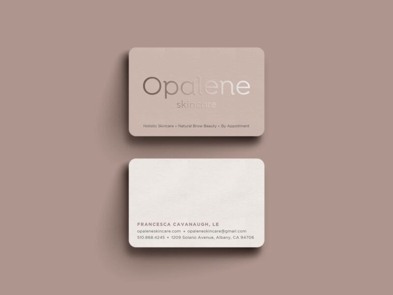 Minimalist business card for a skin care company with spot gloss details