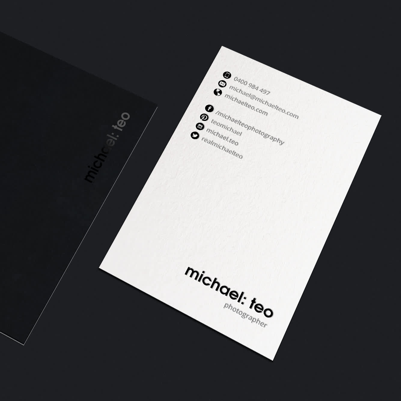 A black and white business card
