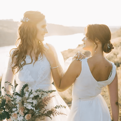 two brides celebrating a wedding in nature
