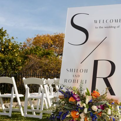 A wedding welcome sign with a monogram design