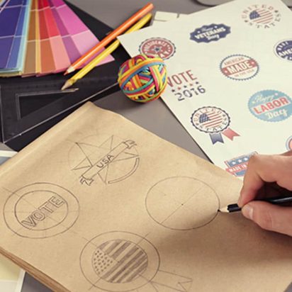 Someone sketching a logo