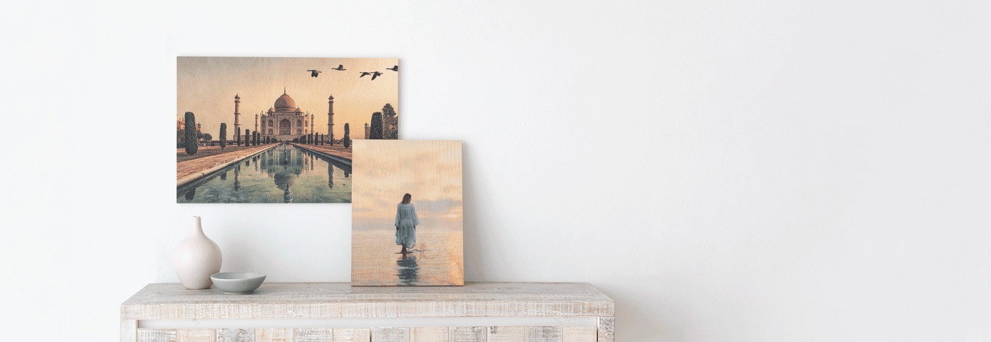 geographical prints adorning fireplace