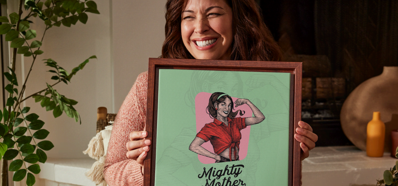 women holding print that says Mighty Mother