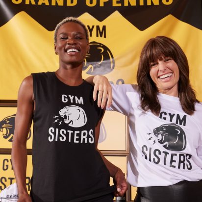 two friends wearing branded tshirts