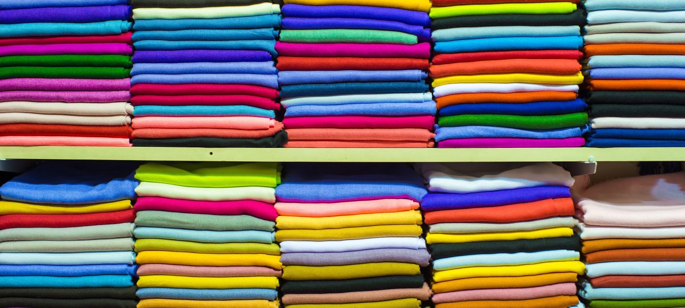 Fashionable shirt shades on shelves