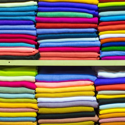 Fashionable shirt shades on shelves