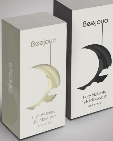 Silk pillowcase packaging design with a crescent moon-shaped cutout revealing the product