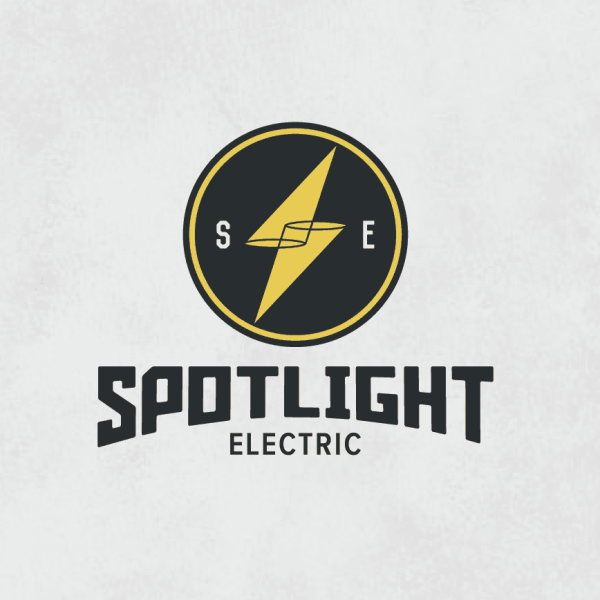 Spotlights that shape a lightening bolt for an electric company logo