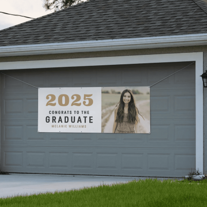 graduation banner hanging over a garage