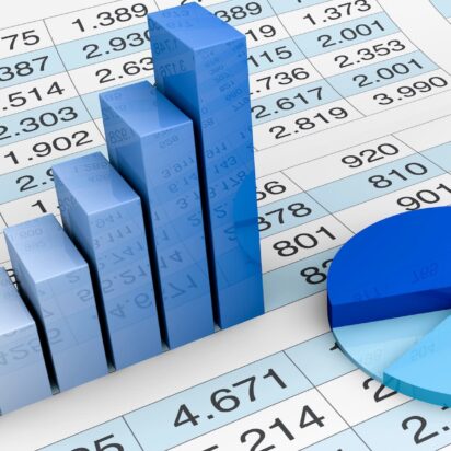 blue pie chart and bar graph on top of data sheet