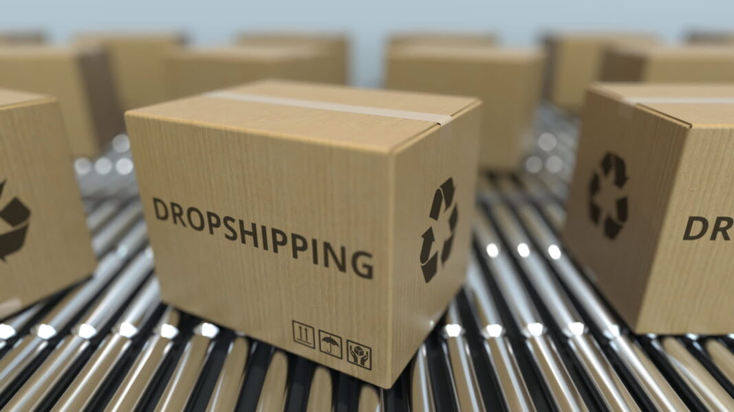 Boxes labeled dropshipping moving on a conveyor belt – what is dropshipping concept.