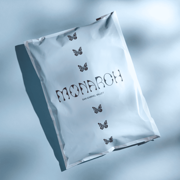 Black logo printed on mailer packaging