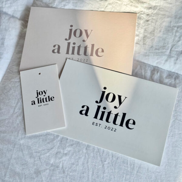 Black logo printing on postcards and hand tags