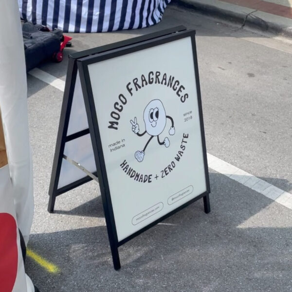 Black logo printed on A-frame sign