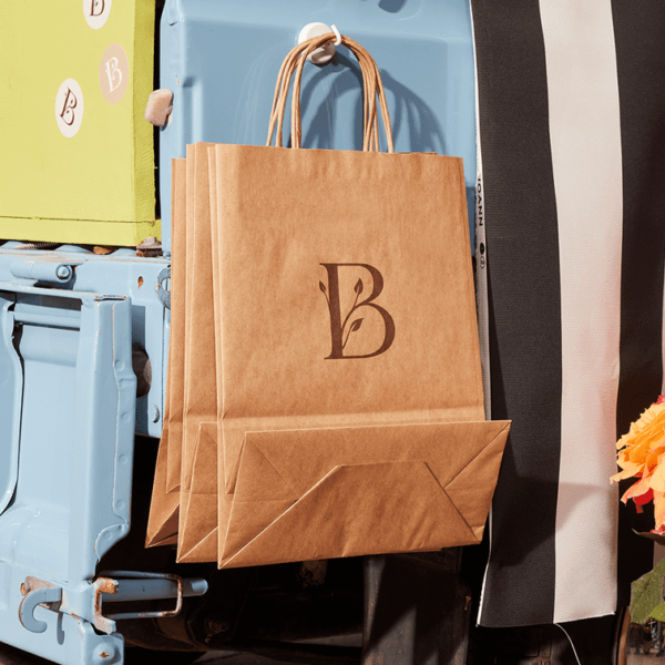Brown logo on kraft paper bag for flower business
