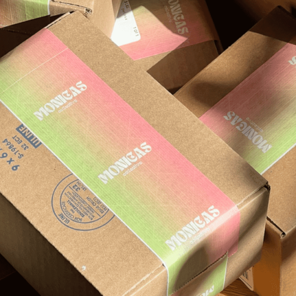 White logo printed on branded tape packaging