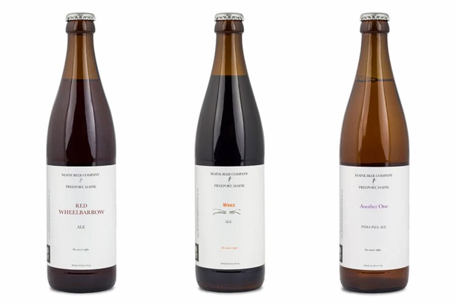 White beer bottle label with minimal serif text and clean white space.