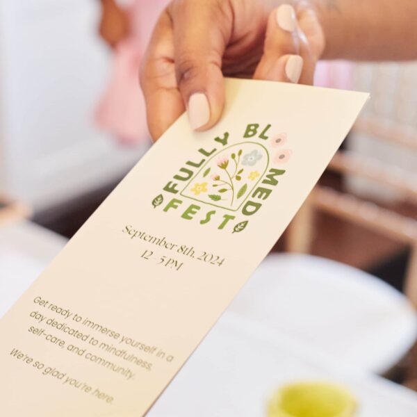 Green logo on a brochure for wellness retreat