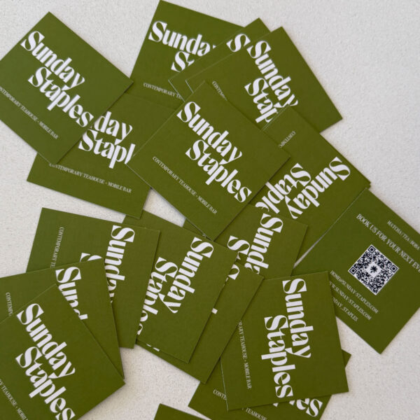 Green logo on a square business card