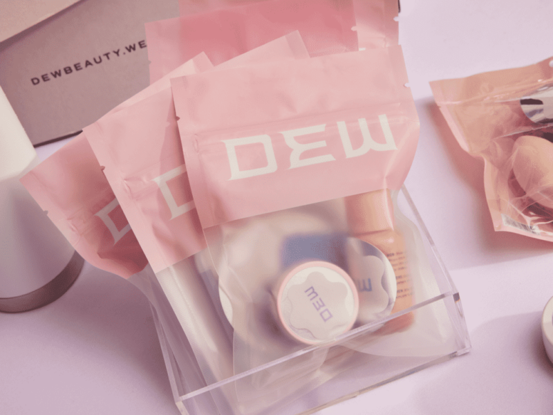 Semi-transparent plastic packaging for assorted skincare products.