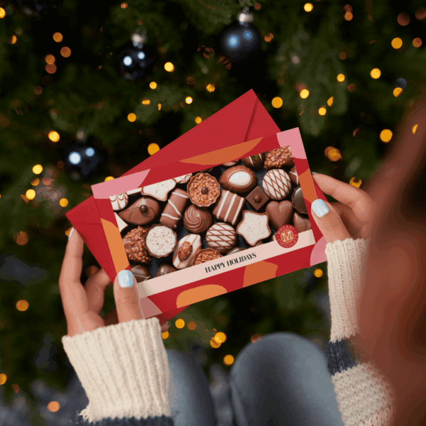 &lsquo;Happy Holidays&rsquo; postcard with chocolates on