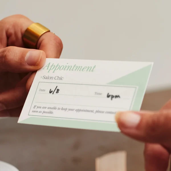 A green and white appointment card for a beauty salon, types of business cards