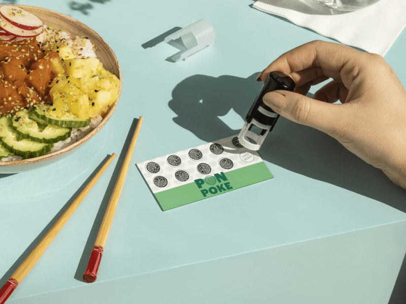 A loyalty business card with stamps for a restaurant