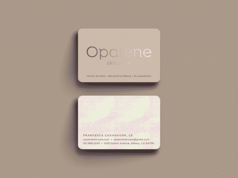 Minimalist business card for a skin care company with spot gloss details