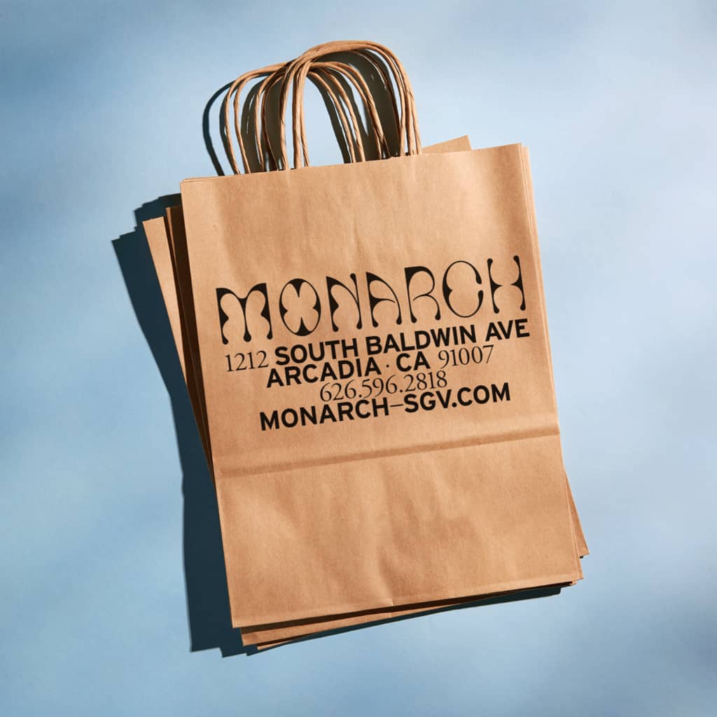 Branded kraft paper bag made from sustainable materials, showcasing an eco-friendly packaging option for small businesses.