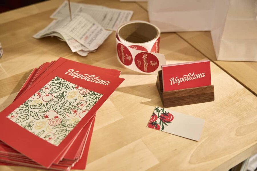Branded menus, stickers and business cards using Napoletana&rsquo;s brand imagery, colors, logo and fonts