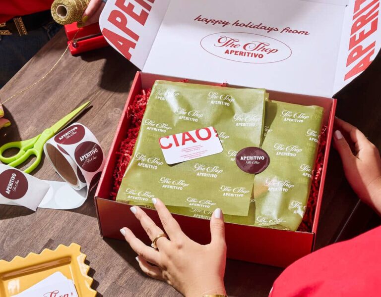 Holiday packaging using brand colors green and red, elements of a brand