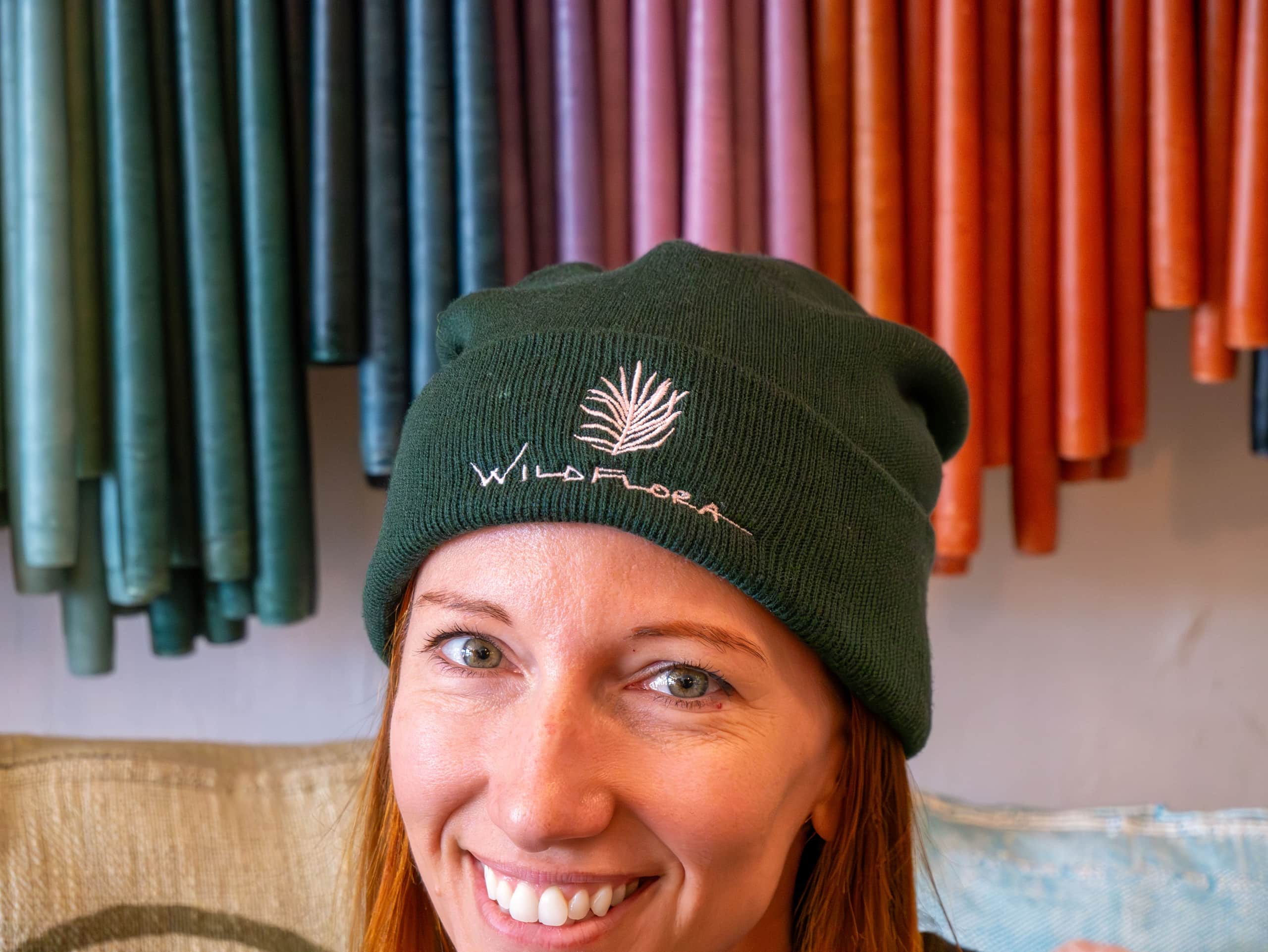 Brand name and logo on beanie merchandise, elements of a brand