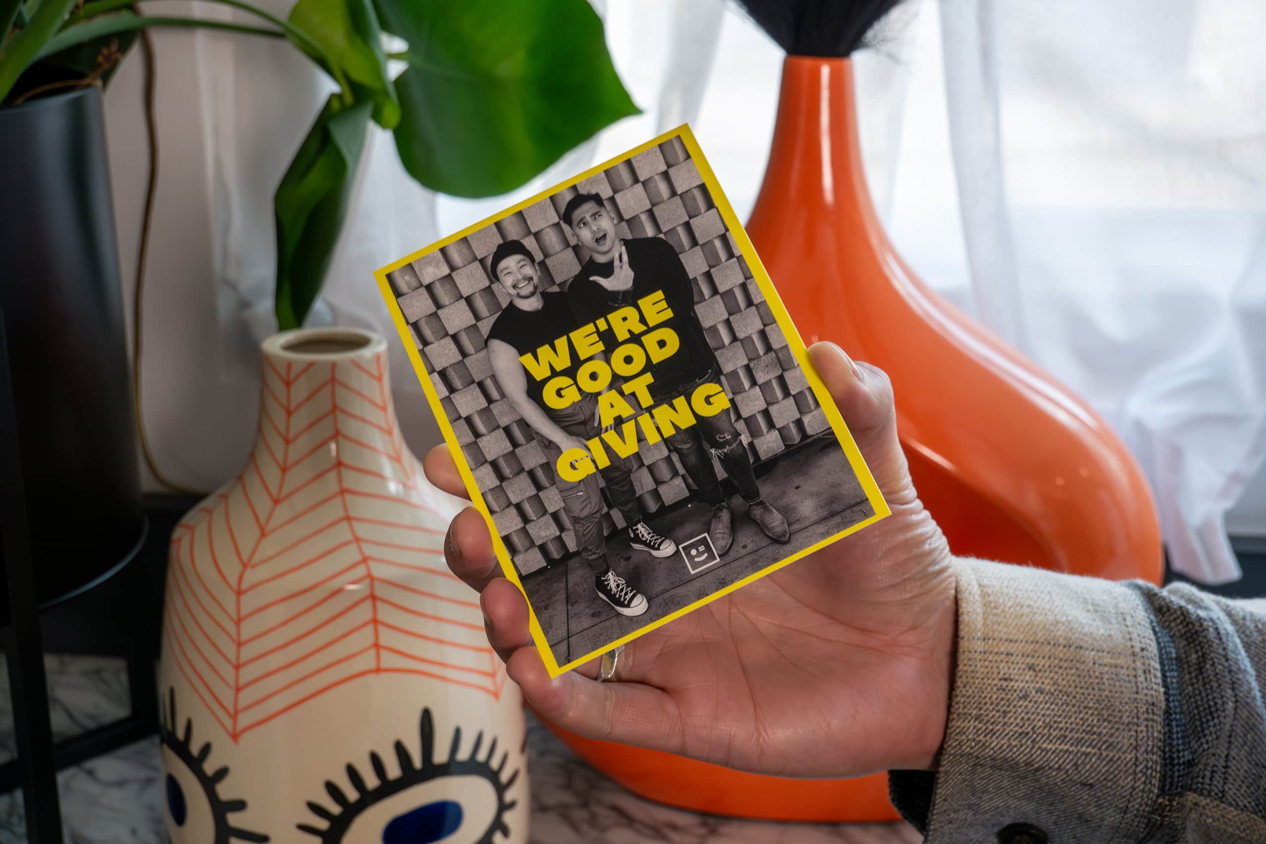 Postcard marketing with the brand tagline “we’re good at giving”