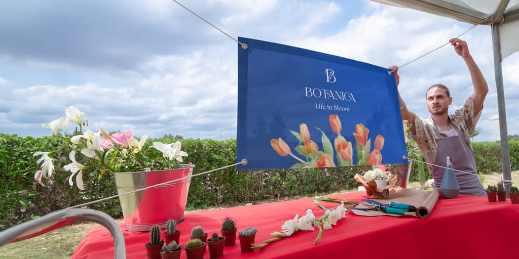 Signage for a flower company with botanical-inspired logo