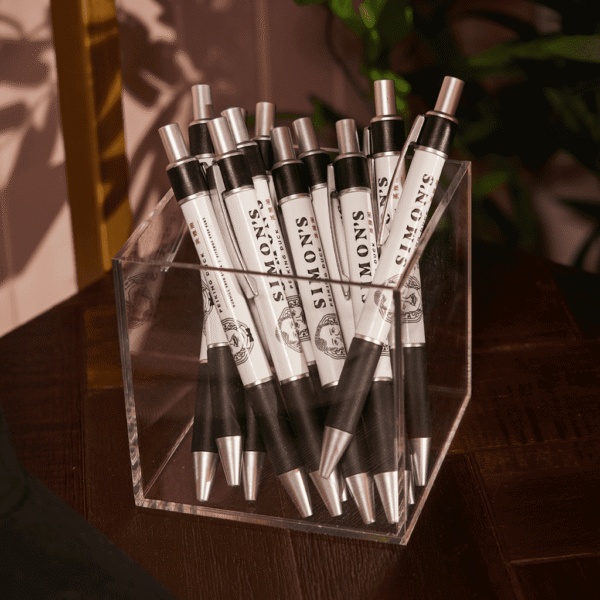 A selection of branded pens with the brand logo printed on the plastic surface using pad printing