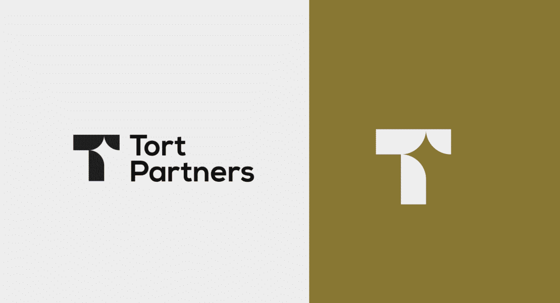 Minimalistic logo design with a letter T and a star in negative space