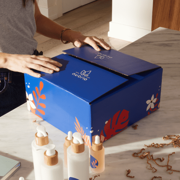 Brand logo printed on a blue cardboard packaging box