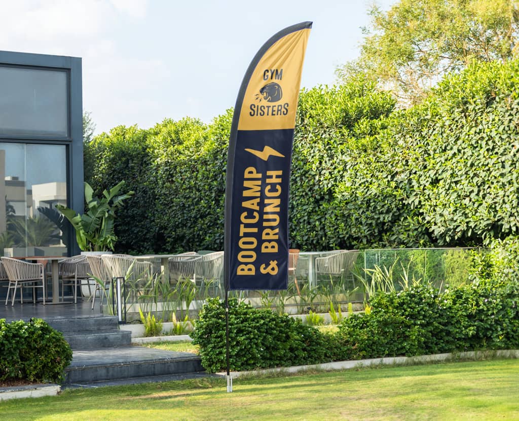 black and yellow flag banner advertising a gym bootcamp event
